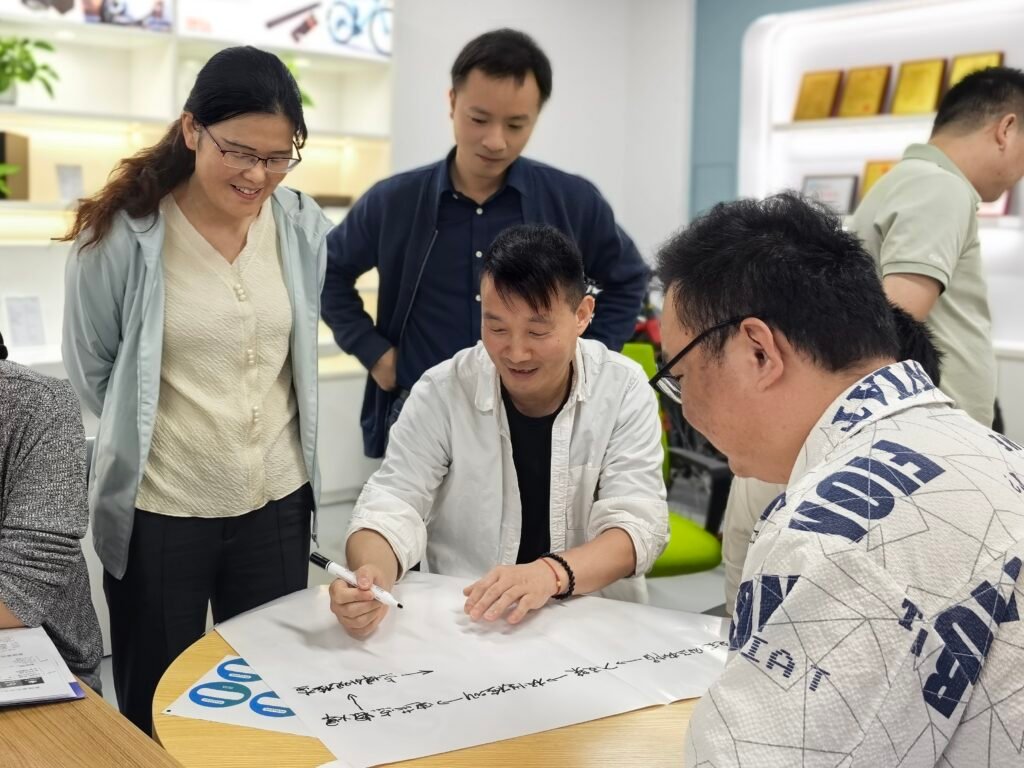 Engineers identifying risks in battery production process