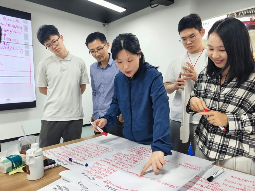 Cross-functional teams working on PFMEA analysis